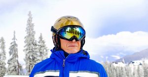 mature adult in ski gear