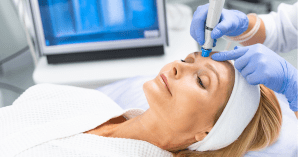 Woman receiving a salmon sperm facial