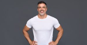 healthy male with hands on waist