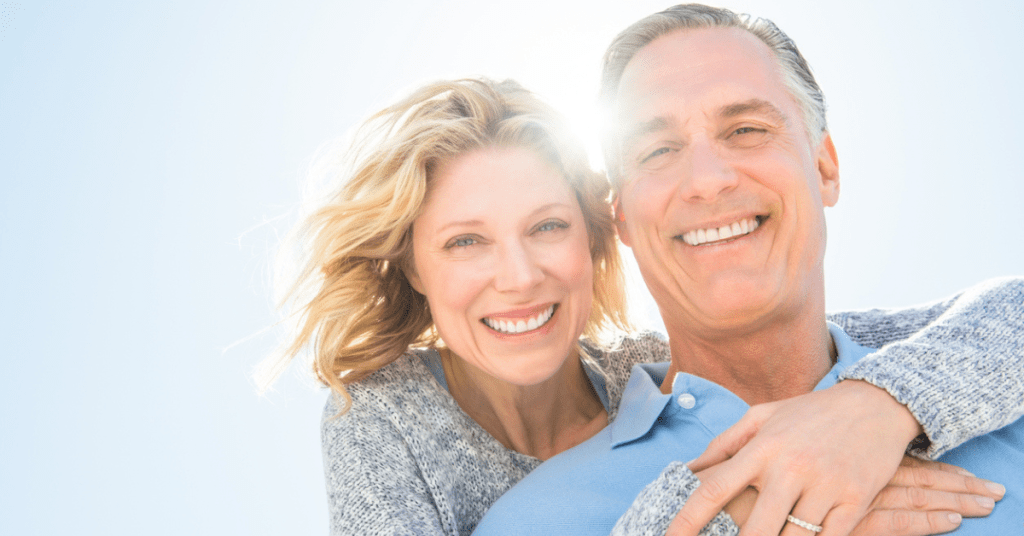 couple with glowing skin after receiving the Austin Regen Facelift with NOUVADerm laser.