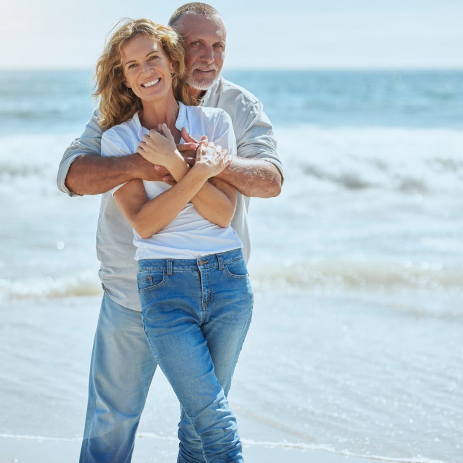 Extracorporeal Shockwave Therapy for ED Couple on beach considering extracorporeal shockwave therapy for ED