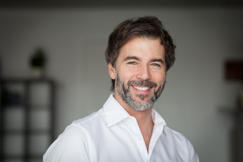 smiling man learning about p-long protocol
